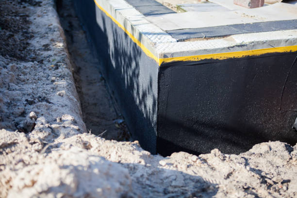 Professional Emergency Waterproofing technician working in Butler, IN